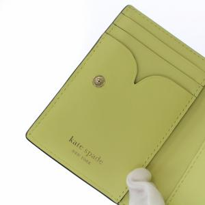 kate spade new york ニコラツイストロック 二つ折り財布 イエロー