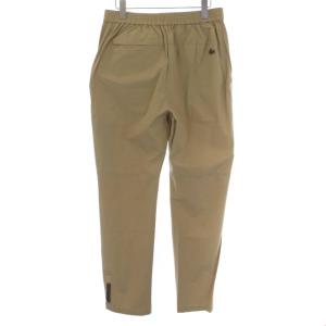 LACOSTE ナイロンパンツ イージーパンツ スリット ロゴボタン FR40 ベージュ