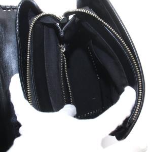 CARVING TRIBES ローラ Lola リュックサック デイパック レザー カットワーク 黒 ブラック アイボリー