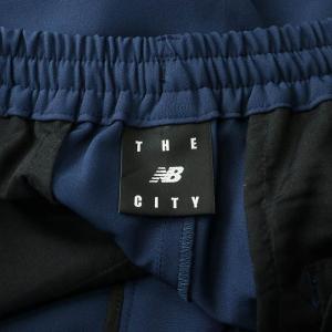New Balance THE CITY スリムテーパードパンツ M ネイビー AMP35032