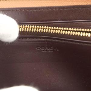 COACH シグネチャー 長財布 ラウンドファスナー 小銭入れ エンボス加工 レザー ピンクベージュ F27865