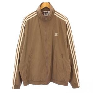 アディカラーウーブンファイヤーバードトラックトップ ジャケット スタンドカラー バイカラー ロゴ ナイロン