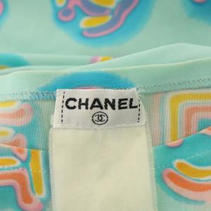 CHANEL チュニック ワンピース ミニ ノースリーブ ロゴ プリント 総柄 水色 ライトブルー