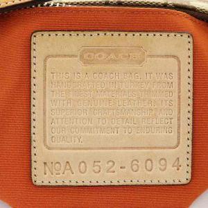 COACH シグネチャーキャンバスレザーデミポーチ ブラウン