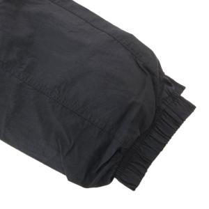NIKE WIND RUNNER + CF WOVEN LD PANT