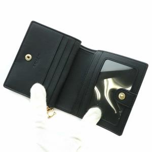 COACH 財布 二つ折り PVC レザー 星 スター 総柄 ロゴ ゴールド金具 黒 ブラック C7297