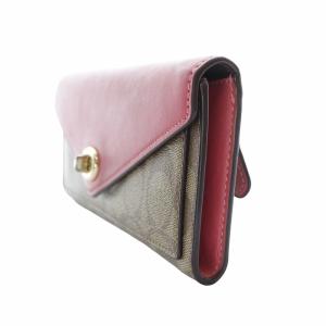 COACH 長財布 小銭入れあり シグネチャー ターンロック PVC レザー ピンク ベージュ C3315