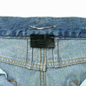 SAINT LAURENT PARIS デニム ジーンズ ジーパン Gパン ダメージ加工 テーパード ボタンフライ 5P 29 青 ブルー インディゴブルー