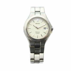 SEIKO ジャンク品 83F2-0220 腕時計 ウォッチ クォーツ カレンダー付き 白文字盤 ロゴ シルバー色