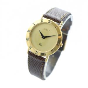 GUCCI ジャンク品 3000M 腕時計 ウォッチ クォーツ ローマン レザーベルト ロゴ ゴールド色 GY18
