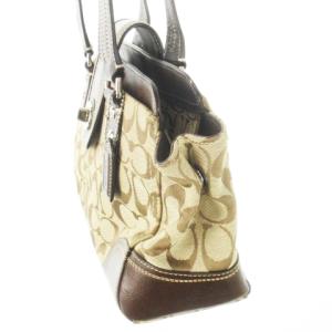 COACH ハンドバッグ キャンバス レザー 革 シグネチャー ロゴ型押し ターンロック 茶 ブラウン F13975