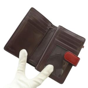 COACH 財布 二つ折り エナメル シグネチャー エンボス加工 ラメ 総柄 ロゴ ゴールド金具 赤 レッド F25937
