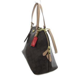 COACH ハンドバッグ ショルダー 2WAY シグネチャー柄 ドーム型 チャーム付き 茶 ブラウン F26184