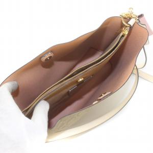 COACH モリー バケット ショルダーバック クロスボディ シグネチャー 斜め掛け ロゴ チャーム付き PVC キャンバス レザー 茶