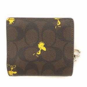 COACH × ピーナッツ Peanuts コラボ スヌーピー 二つ折り財布 ウォレット シグネチャー ウッドストック ロゴ金具 PVC