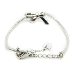 SWAROVSKI リボンスワロバングル シルバー色