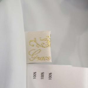 Grace Class シルエットプリントノースリーブ ブラウス チュニック丈 リボン 総柄 36 水色 紺 ライトブルー ネイビー