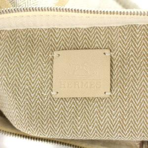 HERMES トゥルース フラット ティピ ポーチ フリンジ フェザー刺繍 キャンバス ベージュ 102701M