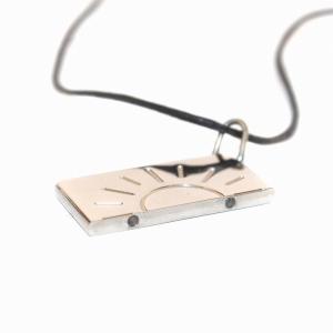 HERMES ネックレス ペンダント 太陽 プレート シルバー色 黒 ブラック