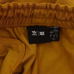 adidas Originals × アイビーパーク IVYPARK トラックパンツ テーパード イージー ロゴ刺繍 S マスタード GV1589