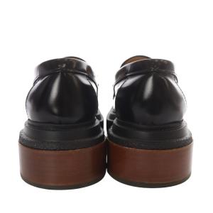 TOD'S LEATHER LOAFERS WITH BRAIDED DETAIL AND HEEL