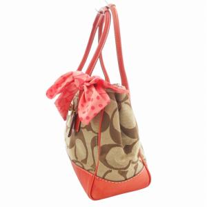 COACH 11557 ハンプトンズミディアムシグネチャー ハンドバッグ トート 肩掛け ターンロック リボン キャンバス