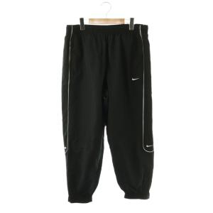 FB8621-010 SOLO SWOOSH TRACK PANT